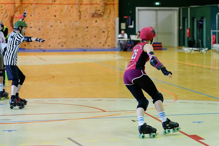 A Dijon jammer skating clear of the pack against Belfort.